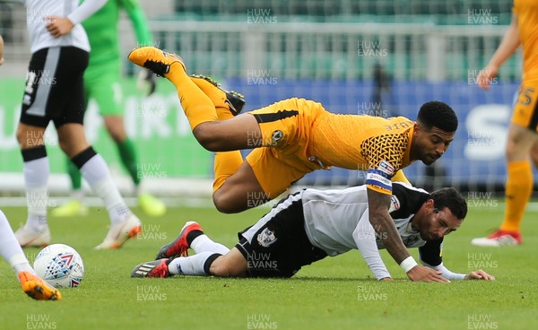 070919 - Newport County v Port Vale, SkyBet League 2 - Joss Labadie of Newport County and David Worrall of Port Vale collide as they compete for the ball