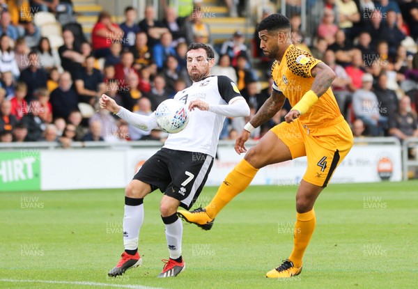 070919 - Newport County v Port Vale, SkyBet League 2 - Joss Labadie of Newport County wins the ball from David Worrall of Port Vale