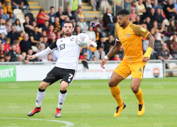 070919 - Newport County v Port Vale, SkyBet League 2 - Joss Labadie of Newport County wins the ball from David Worrall of Port Vale