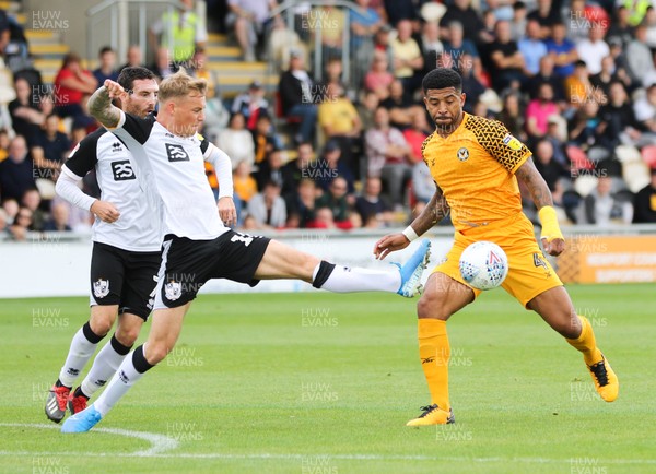 070919 - Newport County v Port Vale, SkyBet League 2 - Joss Labadie of Newport County is challenged by Tom Conlon of Port Vale