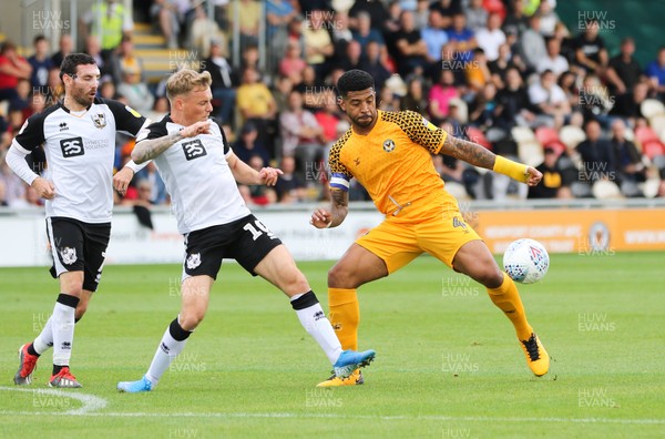 070919 - Newport County v Port Vale, SkyBet League 2 - Joss Labadie of Newport County is challenged by Tom Conlon of Port Vale