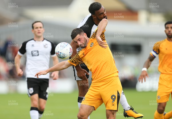 070919 - Newport County v Port Vale, SkyBet League 2 - Padraig Amond of Newport County is put under pressure by Leon Legge of Port Vale as he wins the ball