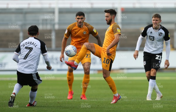 070919 - Newport County v Port Vale, SkyBet League 2 - Josh Sheehan of Newport County plays the ball past David Worrall of Port Vale