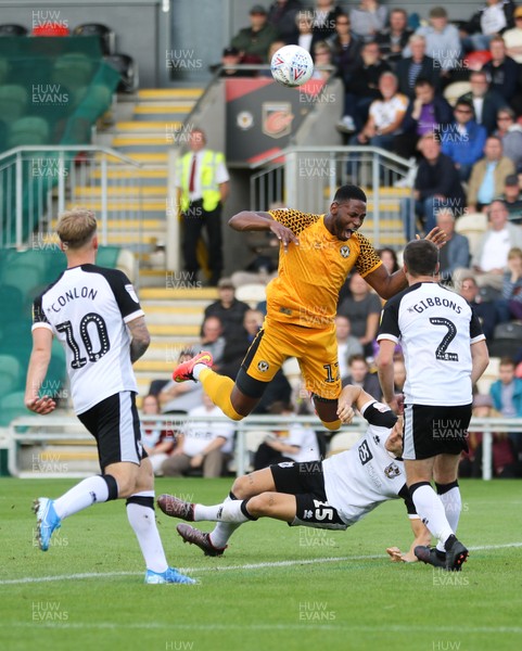 070919 - Newport County v Port Vale, SkyBet League 2 - Jamille Matt of Newport County collides with Nathan Smith of Port Vale as he is brought down and awarded a penalty