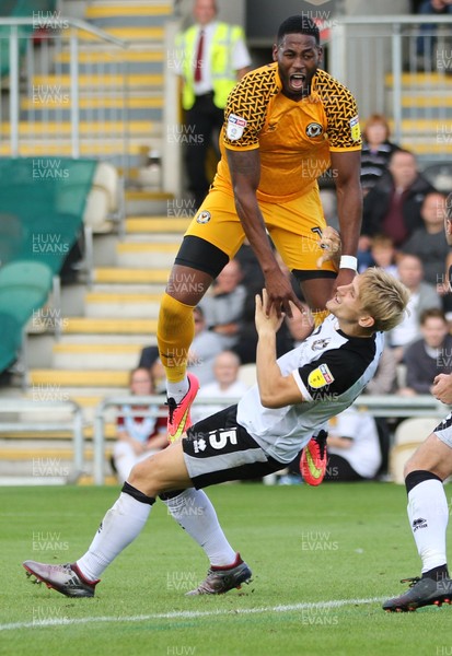 070919 - Newport County v Port Vale, SkyBet League 2 - Jamille Matt of Newport County collides with Nathan Smith of Port Vale as he is brought down and awarded a penalty
