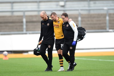 070924 - Newport County v Port Vale - Sky Bet League 2 - Shane McLoughlin of Newport County goes off the field injured