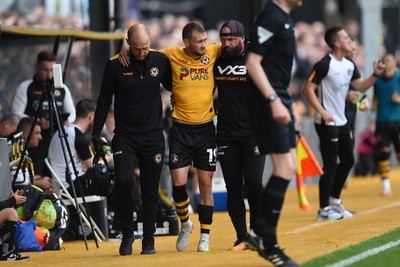 070924 - Newport County v Port Vale - Sky Bet League 2 - Shane McLoughlin of Newport County goes off the field injured