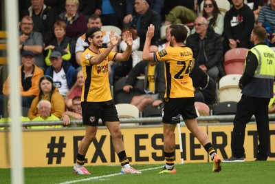 070924 - Newport County v Port Vale - Sky Bet League 2 - Aaron Wildig of Newport County celebrates scoring a goal to equalise the game with team mates