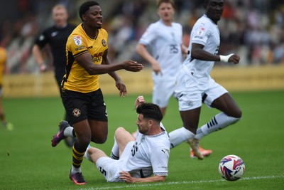 070924 - Newport County v Port Vale - Sky Bet League 2 - Bobby Kamwa of Newport County goes down just outside the box after a foul from Connor Hall of Port Vale