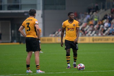 070924 - Newport County v Port Vale - Sky Bet League 2 - Bobby Kamwa of Newport County and Anthony Glennon