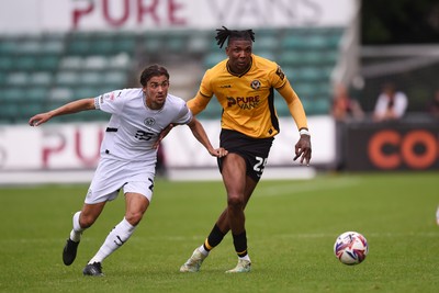 070924 - Newport County v Port Vale - Sky Bet League 2 - Kyle Hudlin of Newport County is challenged by Tom Sang of Port Vale