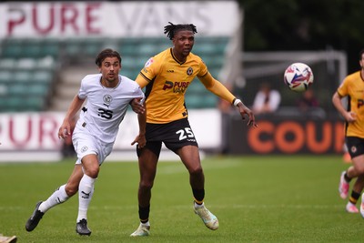 070924 - Newport County v Port Vale - Sky Bet League 2 - Kyle Hudlin of Newport County is challenged by Tom Sang of Port Vale