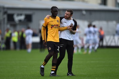 070924 - Newport County v Port Vale - Sky Bet League 2 - Nelson Sanca of Newport County and Newport Coach Mark O’Brien looking dejected at full time