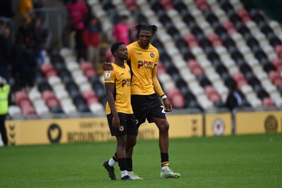 070924 - Newport County v Port Vale - Sky Bet League 2 - Kyle Hudlin of Newport County and Bobby Kamwa looking dejected at full time