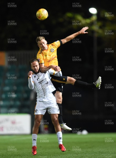 101117 - Newport County v Port Vale - SkyBet League 2 - Mickey Demetriou of Newport County and Marcus Harness of Port Vale compete