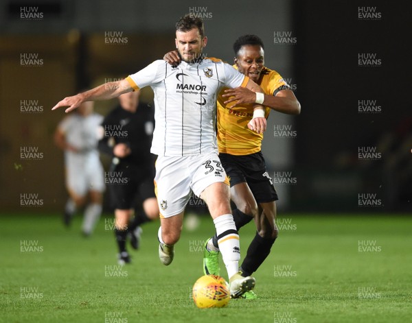 101117 - Newport County v Port Vale - SkyBet League 2 - Gavin Gunning of Port Vale is tackled by Shawn McCoulsky of Newport County