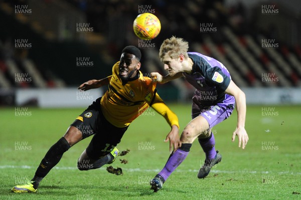 290119 - Newport County v Port Vale - Sky Bet League 2 -   Jamille Matt of Newport County and Nathan Smith of Port Vale battle for the ball