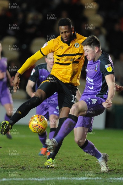 290119 - Newport County v Port Vale - Sky Bet League 2 -   Jamille Matt of Newport County is tackled by Adam Crookes of Port Vale