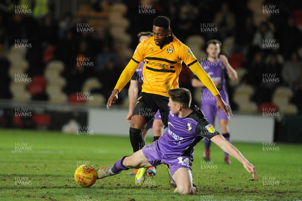 290119 - Newport County v Port Vale - Sky Bet League 2 -   Jamille Matt of Newport County is tackled by Adam Crookes of Port Vale