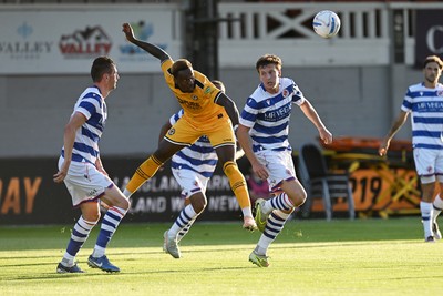 280726 - Newport County v Reading - Preseason Friendly - Shaquille Gwengwe of Newport County heads the ball
