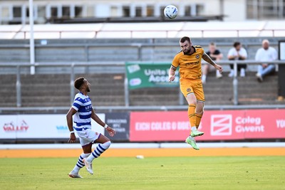 280726 - Newport County v Reading - Preseason Friendly - Kyle Cameron of Newport County heads the ball