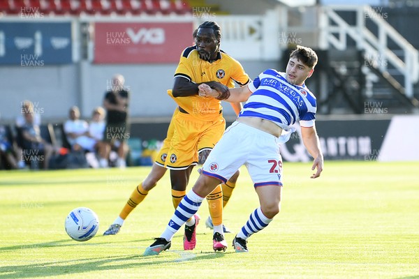 280726 - Newport County v Reading - Preseason Friendly - Yahya Bamba of Newport County is challenged by Josh Stokes of Reading
