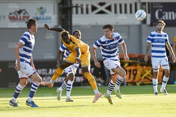 280726 - Newport County v Reading - Preseason Friendly - Shaquille Gwengwe of Newport County heads the ball