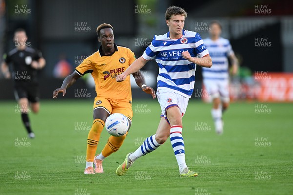 280726 - Newport County v Reading - Preseason Friendly - Shaquille Gwengwe of Newport County is challenged by Ben Ward of Reading