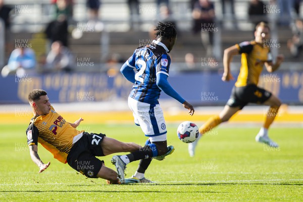 081022 - Newport County v Rochdale - Sky Bet League 2 - Adam Lewis of Newport County tackles Femi Seriki of Rochdale