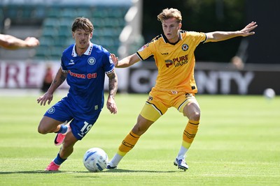 150826 - Newport County v Rochdale - Sky Bet League 2 - Tom Davies of Newport County is challenged by Luke Hannant of Rochdale