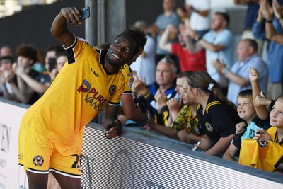 150826 - Newport County v Rochdale - Sky Bet League 2 - Yahya Bamba of Newport County with fans at full time