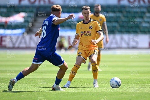 150826 - Newport County v Rochdale - Sky Bet League 2 - Ciaran Brennan of Newport County is challenged by Harvey Gilmour of Rochdale