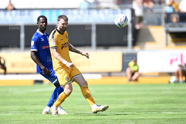 150826 - Newport County v Rochdale - Sky Bet League 2 - Kyle Cameron of Newport County is challenged by Mani Dieseruvwe of Rochdale