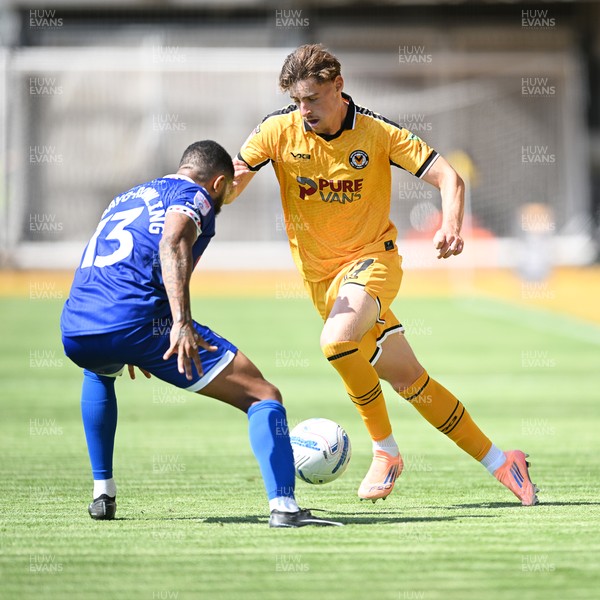 150826 - Newport County v Rochdale - Sky Bet League 2 - Alfie Merritt of Newport County is challenged by Tobi Adebayo-Rowling of Rochdale