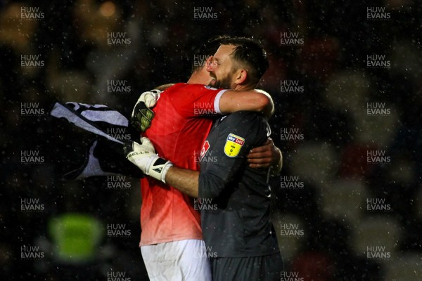021119 - Newport County v Salford City - Sky Bet League 2 - Goalkeeper Mark Howard and Cameron Burgees of Salford City celebrate at the end of the game