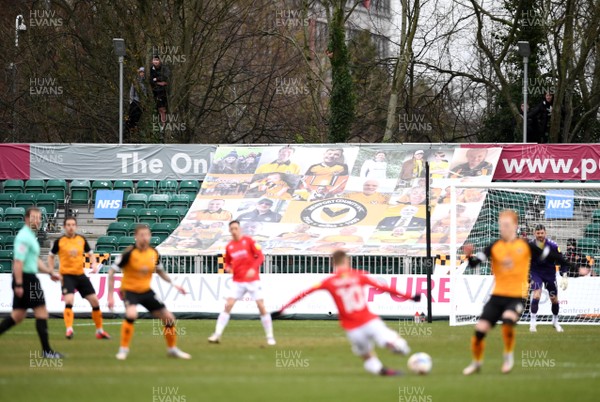 160121 - Newport County v Salford City - SkyBet League 2 - Boys watch the game after climbing trees outside the ground