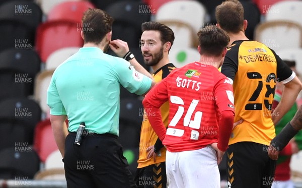 160121 - Newport County v Salford City - SkyBet League 2 - Josh Sheehan of Newport County appeals to referee Anthony Backhouse after being shown a red card