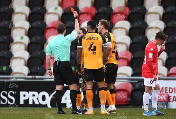 160121 - Newport County v Salford City - SkyBet League 2 - Josh Sheehan (third from right) of Newport County appeals to referee Anthony Backhouse after being shown a red card