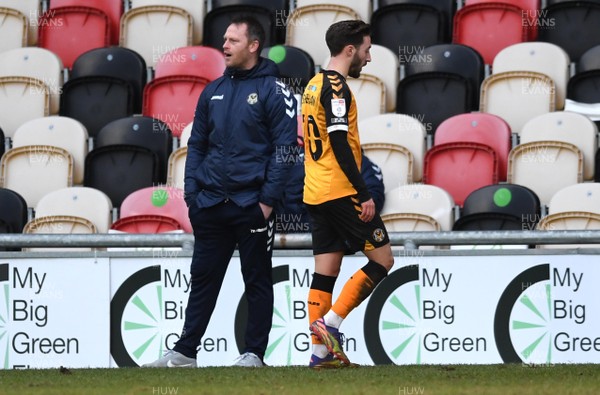 160121 - Newport County v Salford City - SkyBet League 2 - Josh Sheehan of Newport County walks past Newport County manager Michael Flynn after being shown a red card