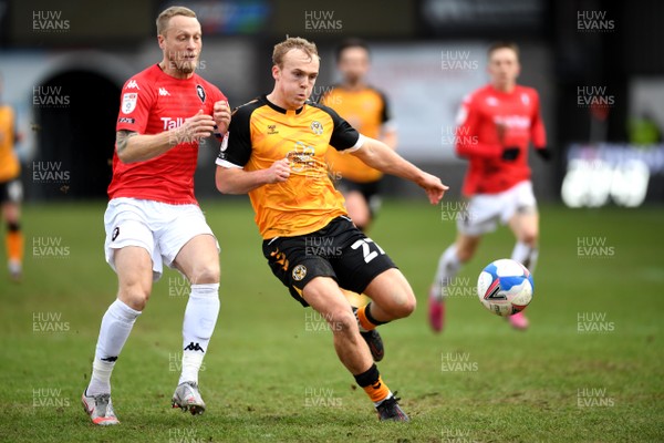 160121 - Newport County v Salford City - SkyBet League 2 - Jake Scrimshaw of Newport County is tackled by Tom Clarke of Salford City
