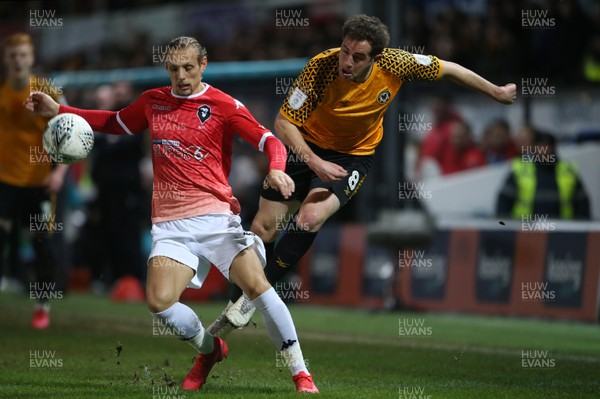 190220 - Newport County v Salford City - Leasingcom Trophy - Matthew Dolan of Newport County is tackled by Oscar Threlkeld of Salford City