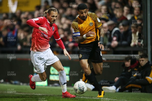 190220 - Newport County v Salford City - Leasingcom Trophy - Joss Labadie of Newport County is challenged by Oscar Threlkeld of Salford City