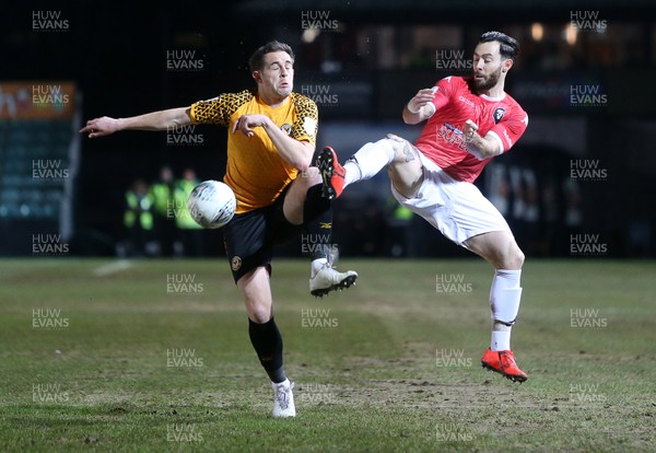 190220 - Newport County v Salford City - Leasingcom Trophy - Richard Towell of Salford City is challenged by Matthew Dolan of Newport County