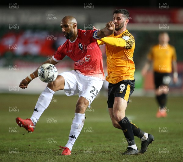 190220 - Newport County v Salford City - Leasingcom Trophy - Nathan Pond of Salford City is challenged by Padraig Amond of Newport County