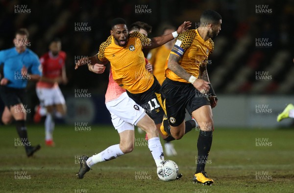 190220 - Newport County v Salford City - Leasingcom Trophy - Jamille Matt of Newport County is tackled by Jack Baldwin of Salford City