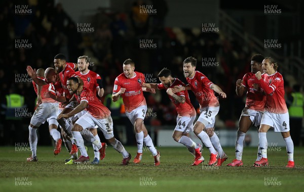 190220 - Newport County v Salford City - Leasingcom Trophy - Salford City celebrate as they win the penalty shoot out