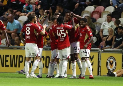 190825 - Newport County v Salford City - SkyBet League Two - Adebola Oluwo of Salford City celebrates scoring a goal with team mates