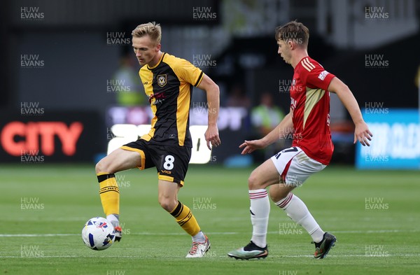 190825 - Newport County v Salford City - SkyBet League Two - Matt Smith of Newport County is challenged by Ben Woodburn of Salford City 