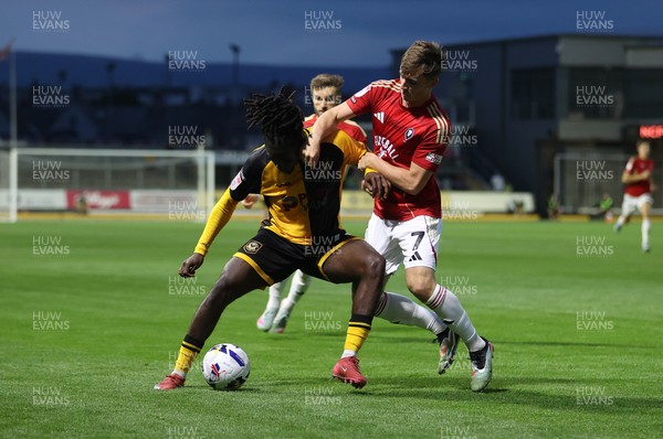 190825 - Newport County v Salford City - SkyBet League Two - Michael Reindorf of Newport County is challenged by Ben Woodburn of Salford City 