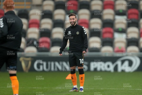 281120 - Newport County v Salford City - FA Cup Second Round -  Josh Sheehan of Newport County warms up  